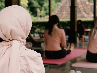 Peaceful evening meditation session near window